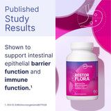 Microbiome Labs Probiotic Supplement 50g capsules on a wooden surface