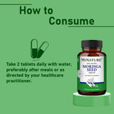 minature Moringa Seed Powder 1000mg supplement tablets close-up