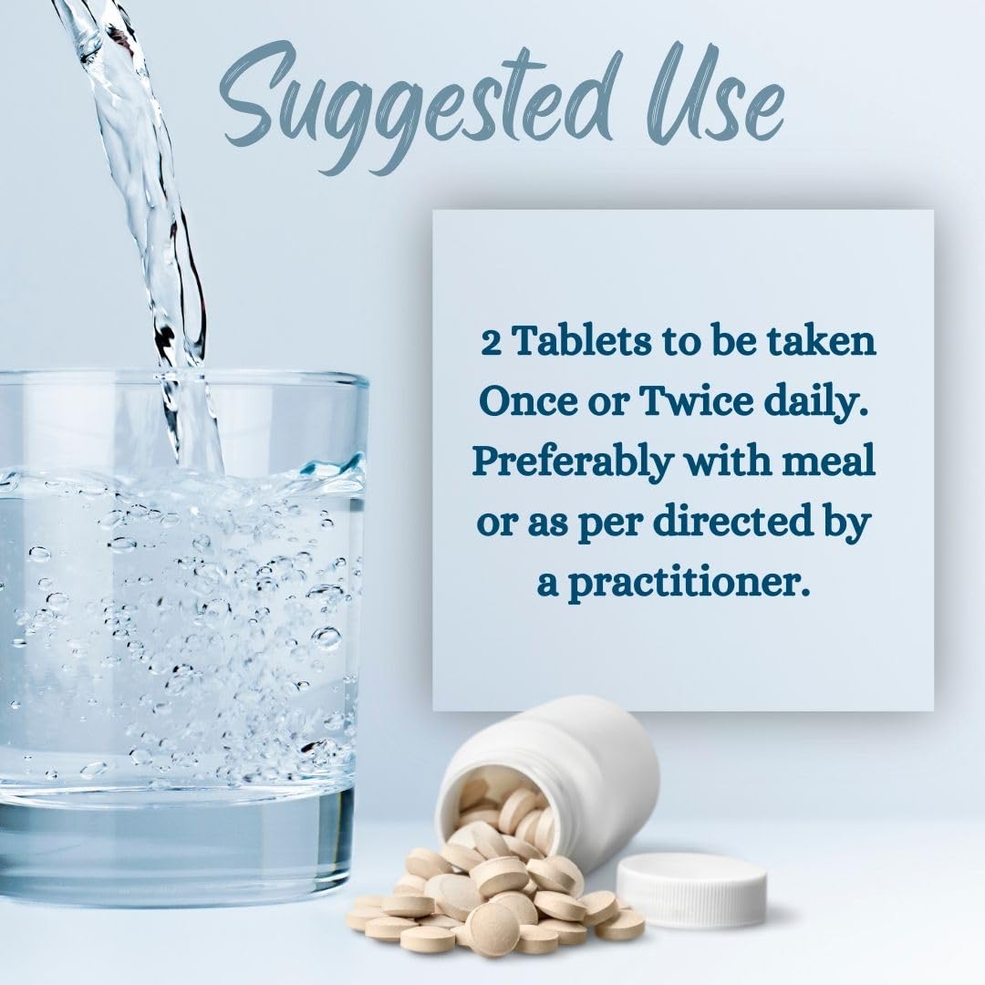 minature Safed Musli Tablets with a measuring spoon