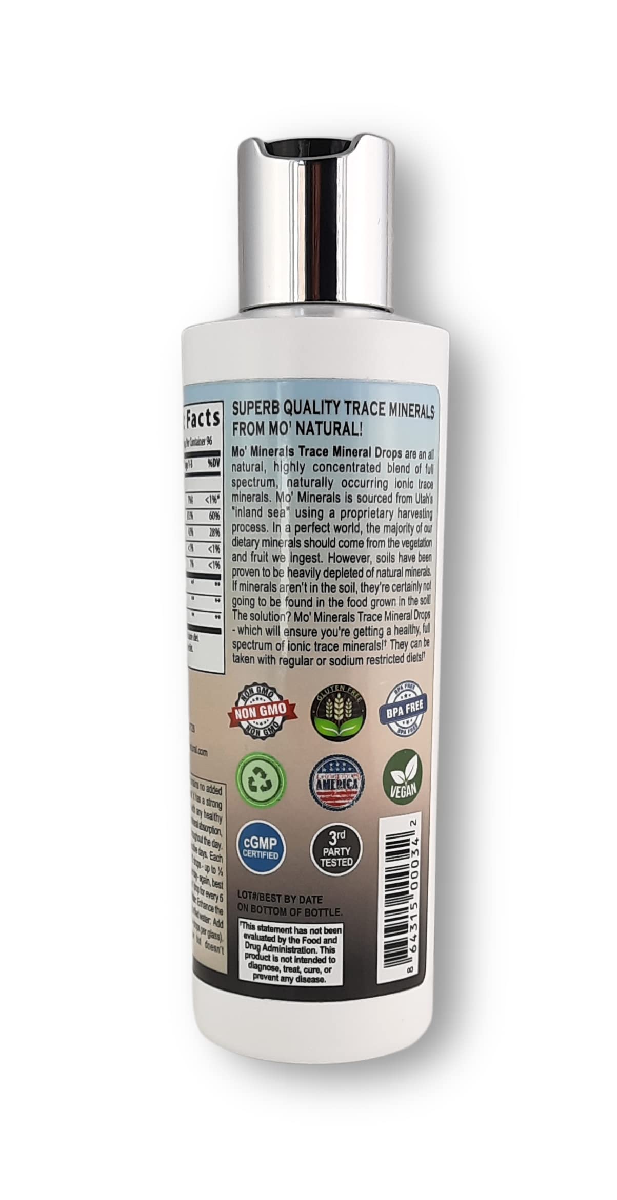 Mo' Natural Trace Mineral Drops 290g in a glass of water