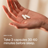 Momentous Magnesium L-Threonate 145mg supplement capsules in hand