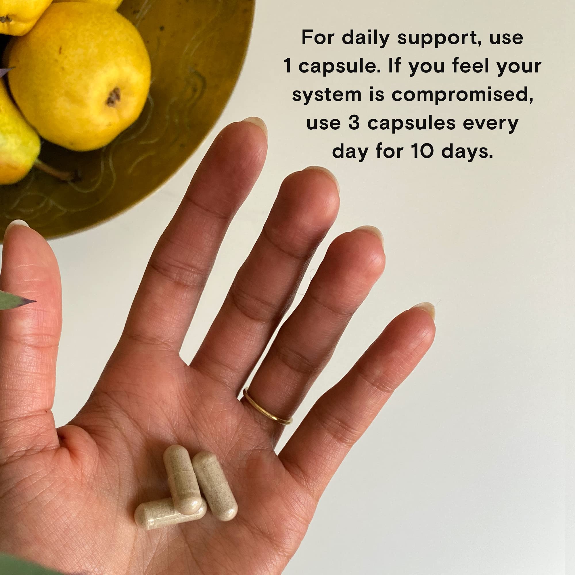 Moon Juice Advanced daily wellness Supplement capsules close-up