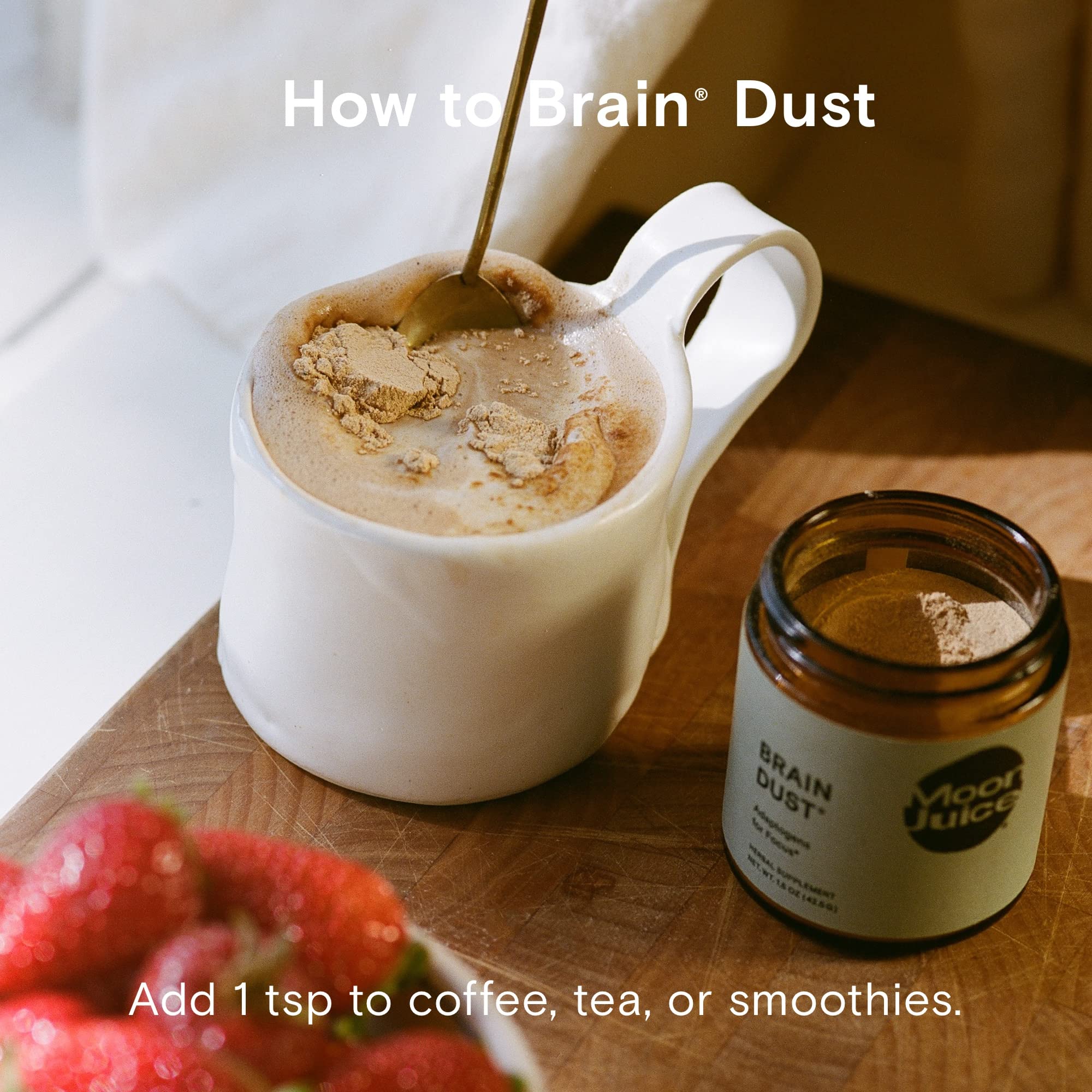 Moon Juice Brain Dust 168g with a cup of tea
