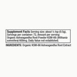 Moon Juice Organic Ashwagandha Powder on a kitchen counter with measuring spoon