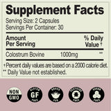 MOOVE Colostrum Supplement bottle with capsules spilled