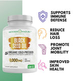 Mother Nature Organics Black Seed Oil Softgels in hand