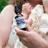 Motherlove Goat's Rue Herbal Supplement in lifestyle setting