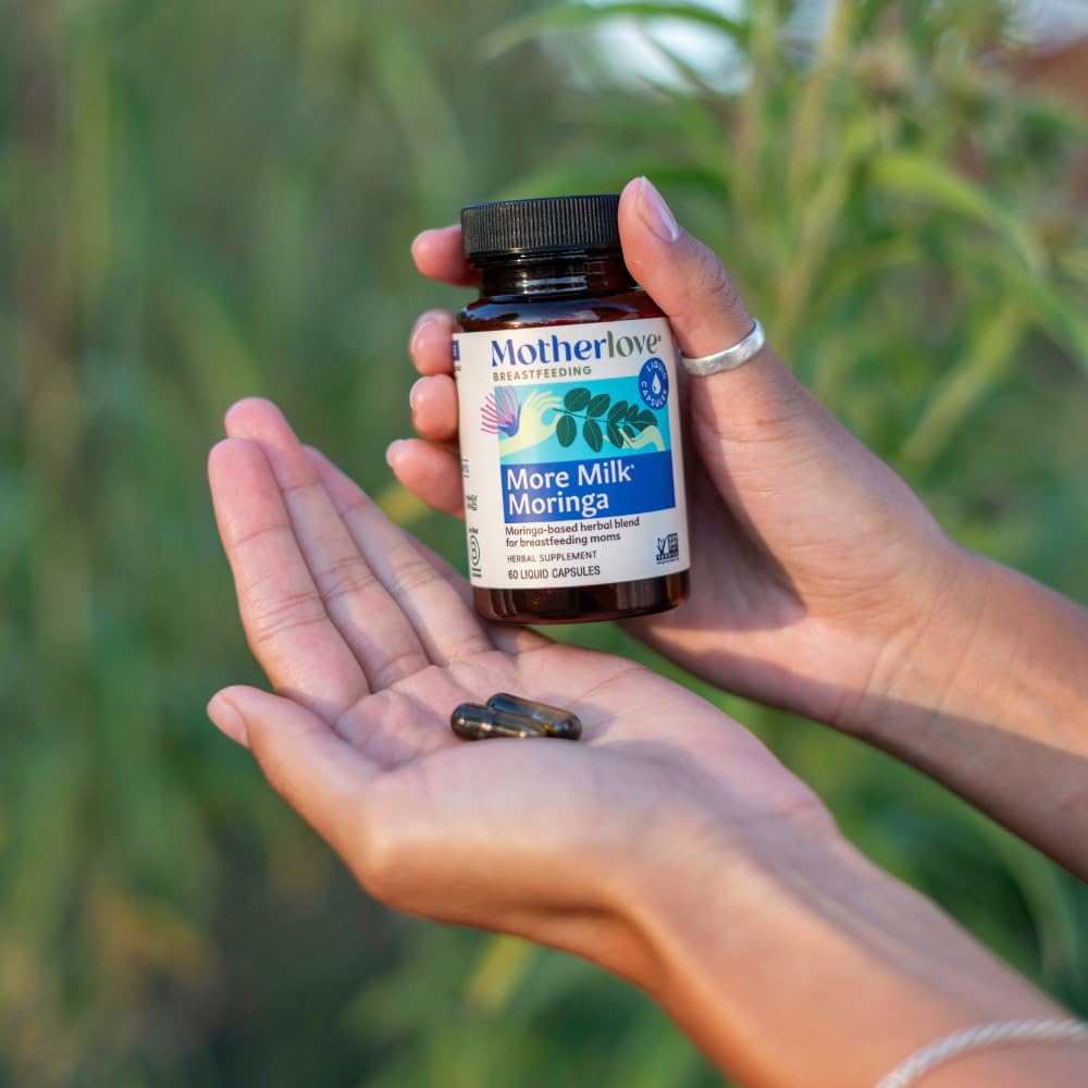 Motherlove More Milk Moringa capsules in hand