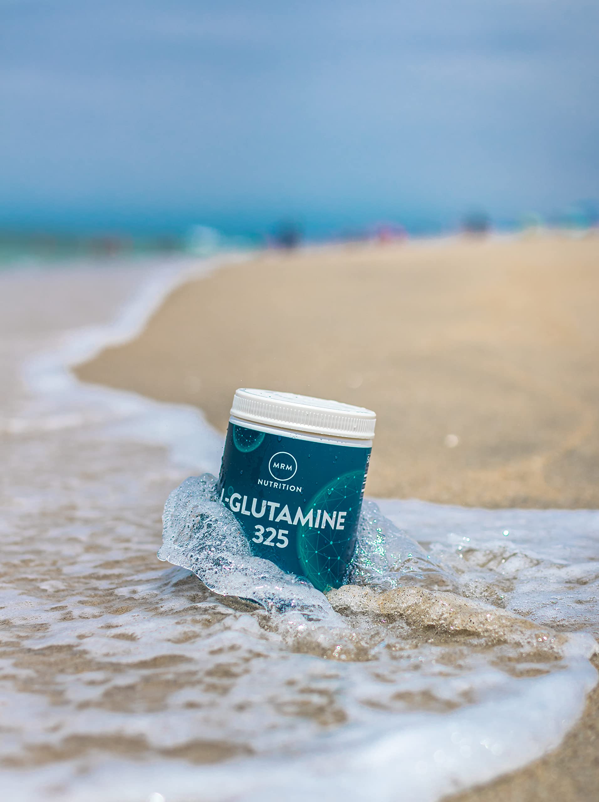 MRM L-Glutamine Powder 1000g on a kitchen counter