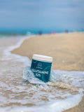MRM L-Glutamine Powder 1000g on a kitchen counter