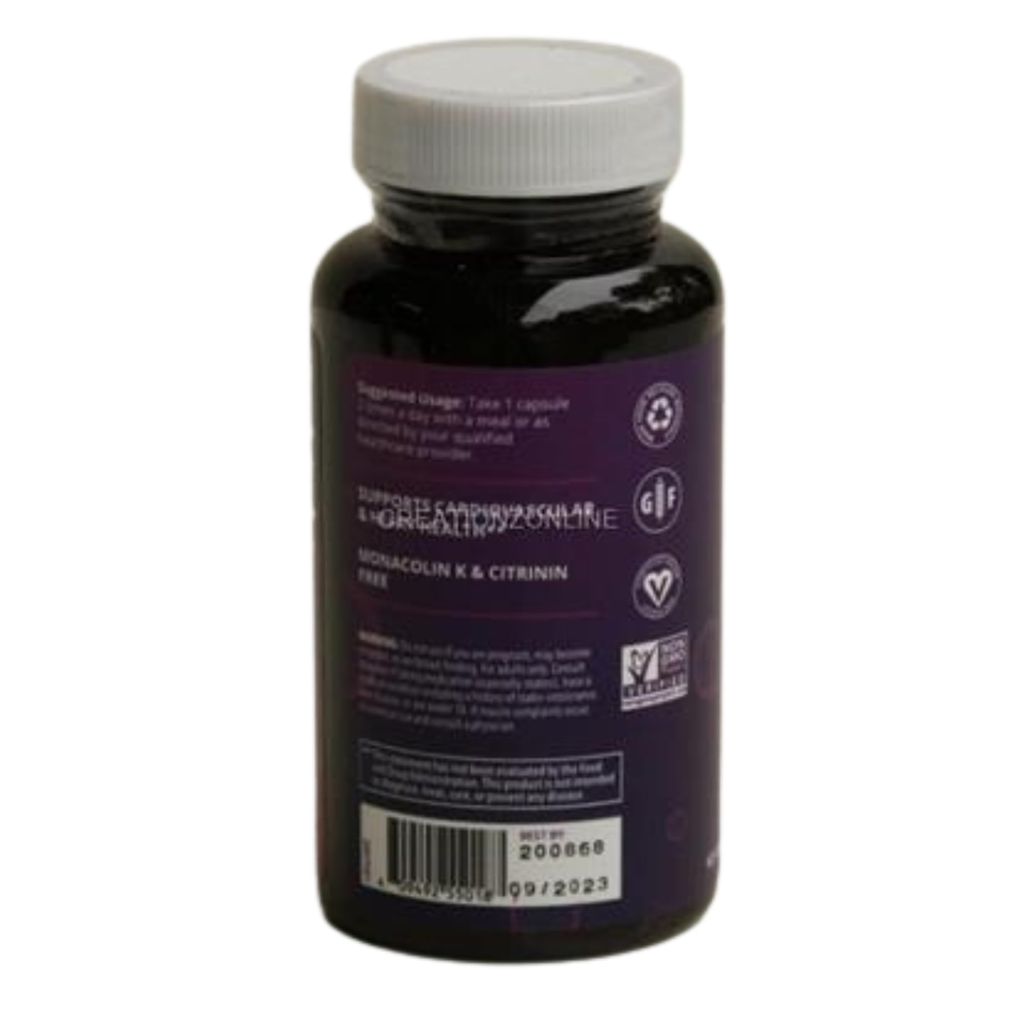 MRM Red Yeast Rice Capsules displayed on a wooden table