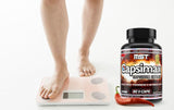 MST Fat Burner Supplement capsules in a hand