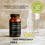 Mt. Angel Vitamins Milk Thistle capsules on a wooden table