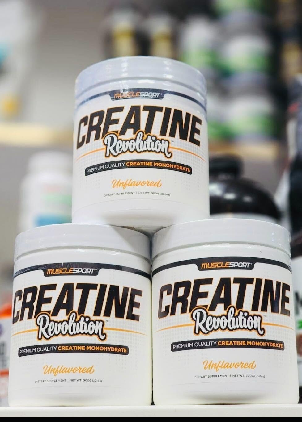 Musclesport Creatine Revolution 300g product close-up showing powder texture