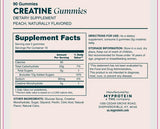 Myprotein Creatine Gummies displayed with gym equipment