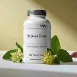 NØØT Ashwagandha Adaptogen Complex capsules on a wooden surface