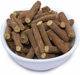 Namo Organics Licorice Root Mulethi Stick on a wooden table