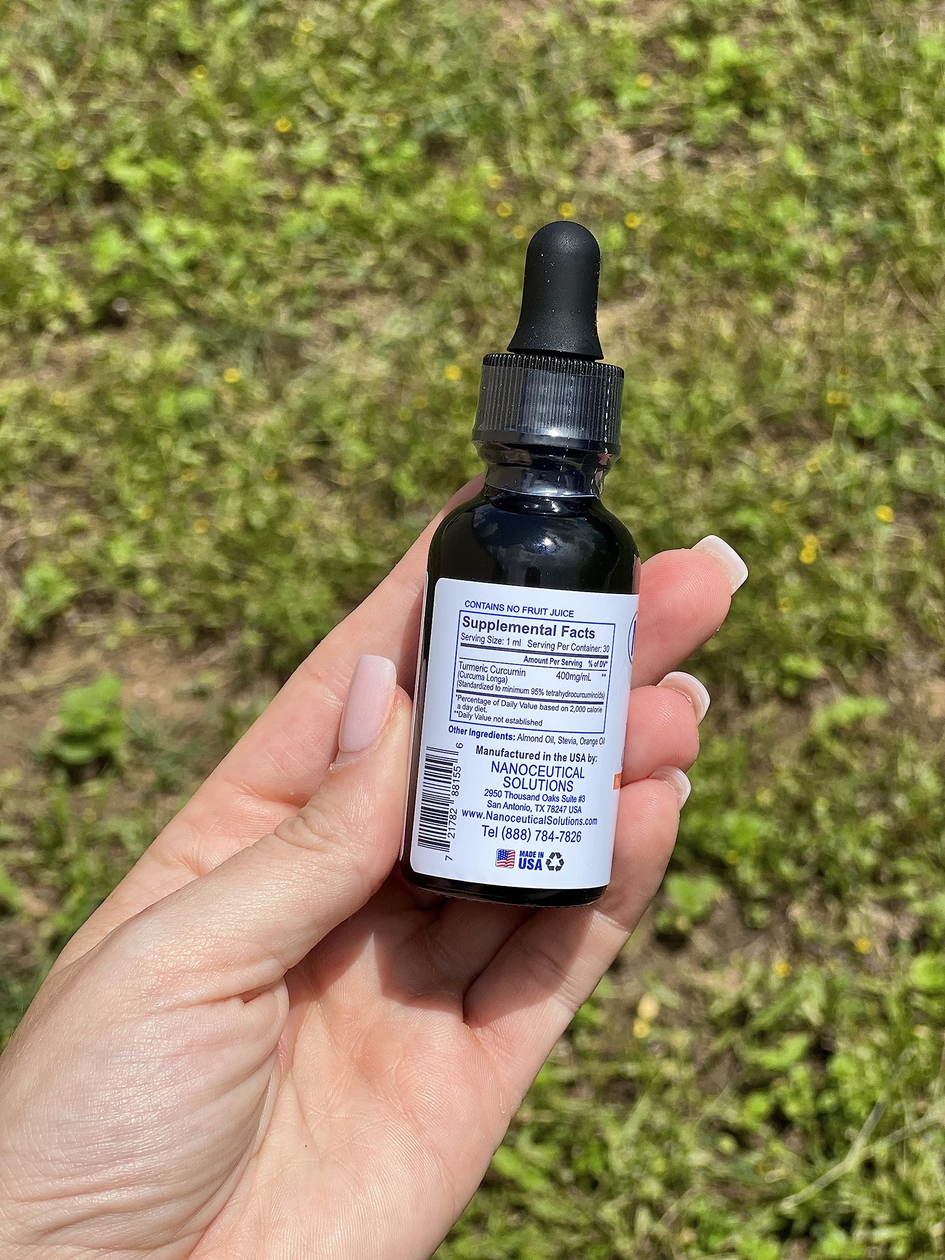 Nanoceutical Solutions Nano Turmeric Curcumin Liquid 400mg with dropper in use