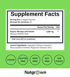 Natgrown Organic Moringa Capsules 1,000 mg on a wooden table
