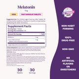 Natrol Kids Fast Dissolve Melatonin 1 mg Strawberry tablets in a child's hand