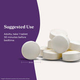 Natrol Melatonin 3 mg Time Release Tablets with a glass of water