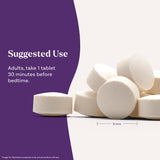 Natrol Melatonin Tablets with a glass of water