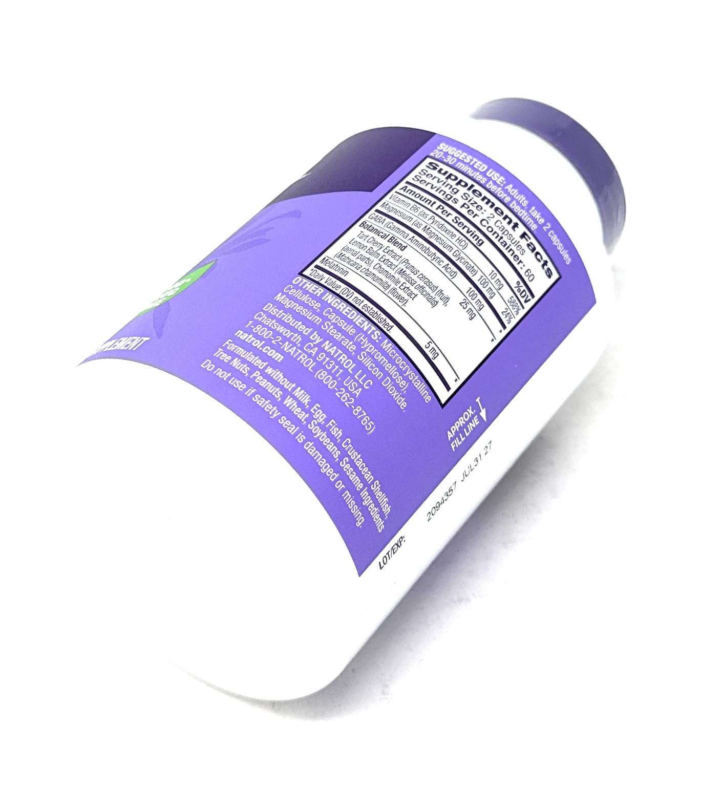 Natrol Sleep & Restore Capsules with a glass of water
