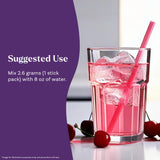 Natrol Sleep & Restore Magnesium Drink Mix on a wooden table