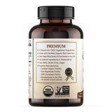 Natural Choice Botanicals Red Yeast Rice 600mg capsules on a wooden surface