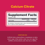 Natural Factors Calcium Citrate 350mg tablets on a wooden surface