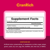 Natural Factors CranRich Cranberry Capsules on a wooden table