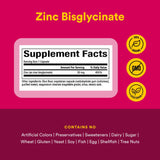 Natural Factors Zinc Bisglycinate 50 mg capsules on a wooden surface