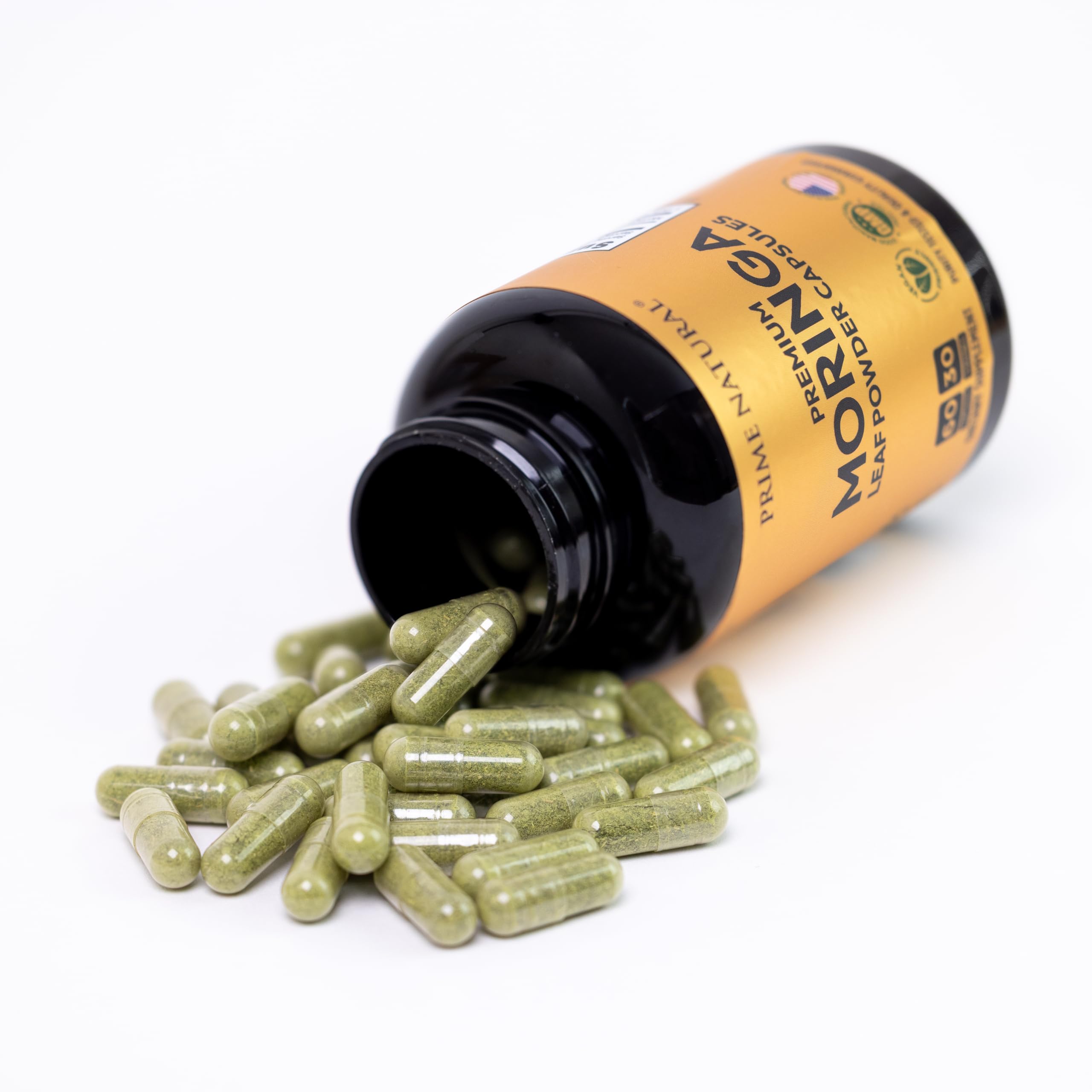 NATURAL Moringa Powder Capsules displayed with other herbal supplements