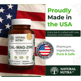 Natural Nutra Calcium Magnesium Zinc Supplement with a glass of water