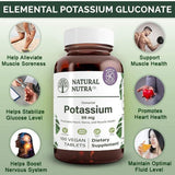 Natural Nutra Potassium Gluconate Supplement capsules displayed on a wooden surface