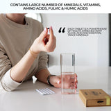 NATURAL SHILAJIT tablets on wooden surface