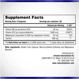 Natural Systems Magnesium Citrate Capsules displayed with a glass of water