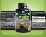 NaturaLife Labs Activated Charcoal Capsules lifestyle scene with greenery