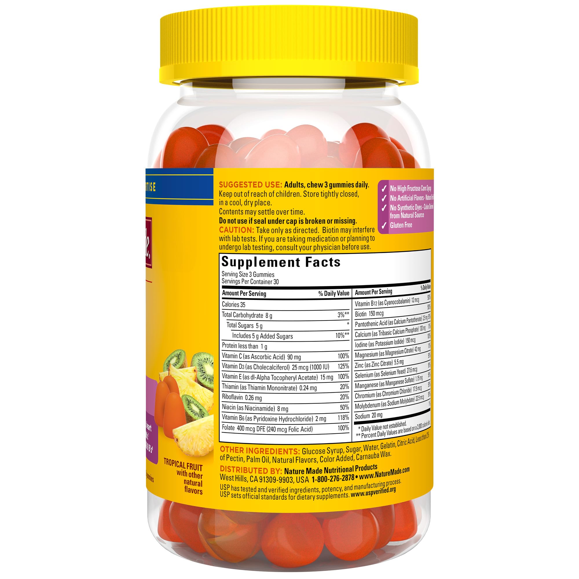Nature Made Advanced Multivitamin Gummies for Her with a measuring spoon