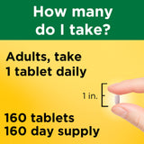 Nature Made B12 1000mcg Time Release Tablets with a glass of water