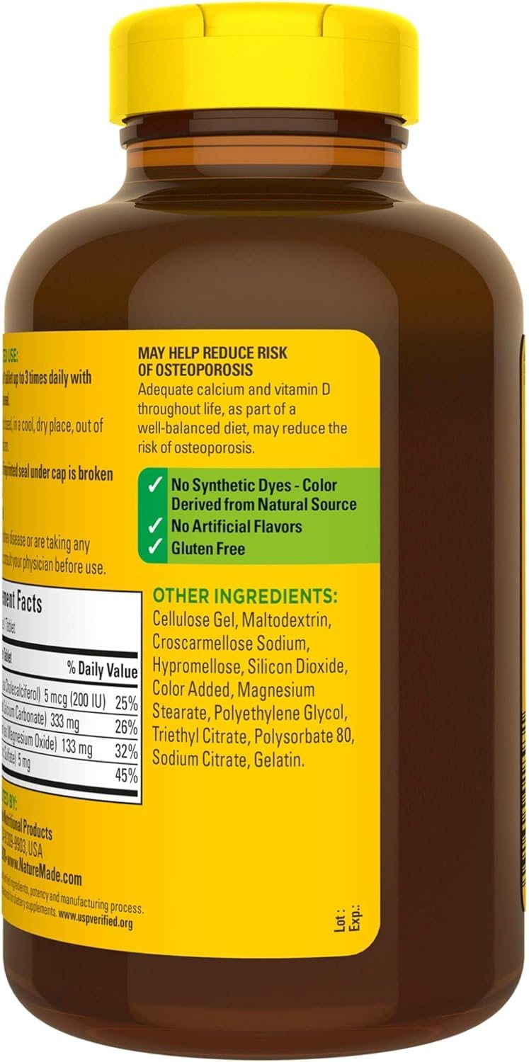 Nature Made Calcium Magnesium Zinc Vitamin D tablet close-up