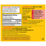 Nature Made CoQ10 300 mg Softgels on a wooden table