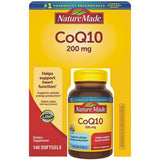 Nature Made CoQ10 softgels in a lifestyle setting with water and meal