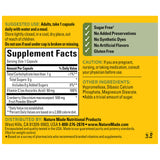 Nature Made Cranberry Capsules 500mg with a glass of water
