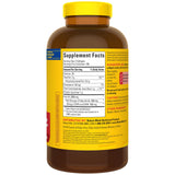 Nature Made Fish Oil 1000 mg Softgels lifestyle scene with a glass of water