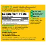 Nature Made L-Lysine 1000mg Tablets with a glass of water