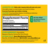 Nature Made Magnesium Glycinate 200mg capsules in a hand