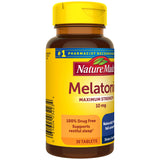 Nature Made Melatonin 10 mg Extra Strength Tablets with a glass of water