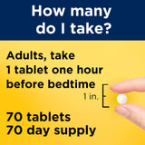 Nature Made Melatonin 10mg Maximum Strength Tablets on a wooden surface