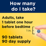 Nature Made Melatonin Extended Release Tablets on a wooden table